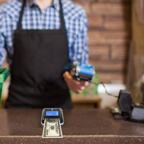 Testeur de billets de banque et machine à compter