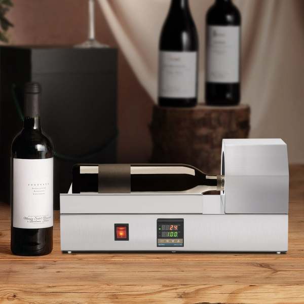 Machine de thermorétraction de capsules en PVC, Machine d'emballage de capsules de bouteilles de vin pour capsules en PVC Machine de thermorétraction de capsules en PVC, Machine d'emballage de capsules de bouteilles de vin pour capsules en PVC